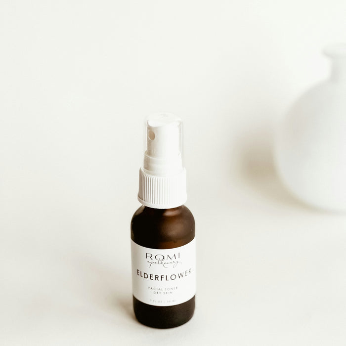 white and brown labeled bottle