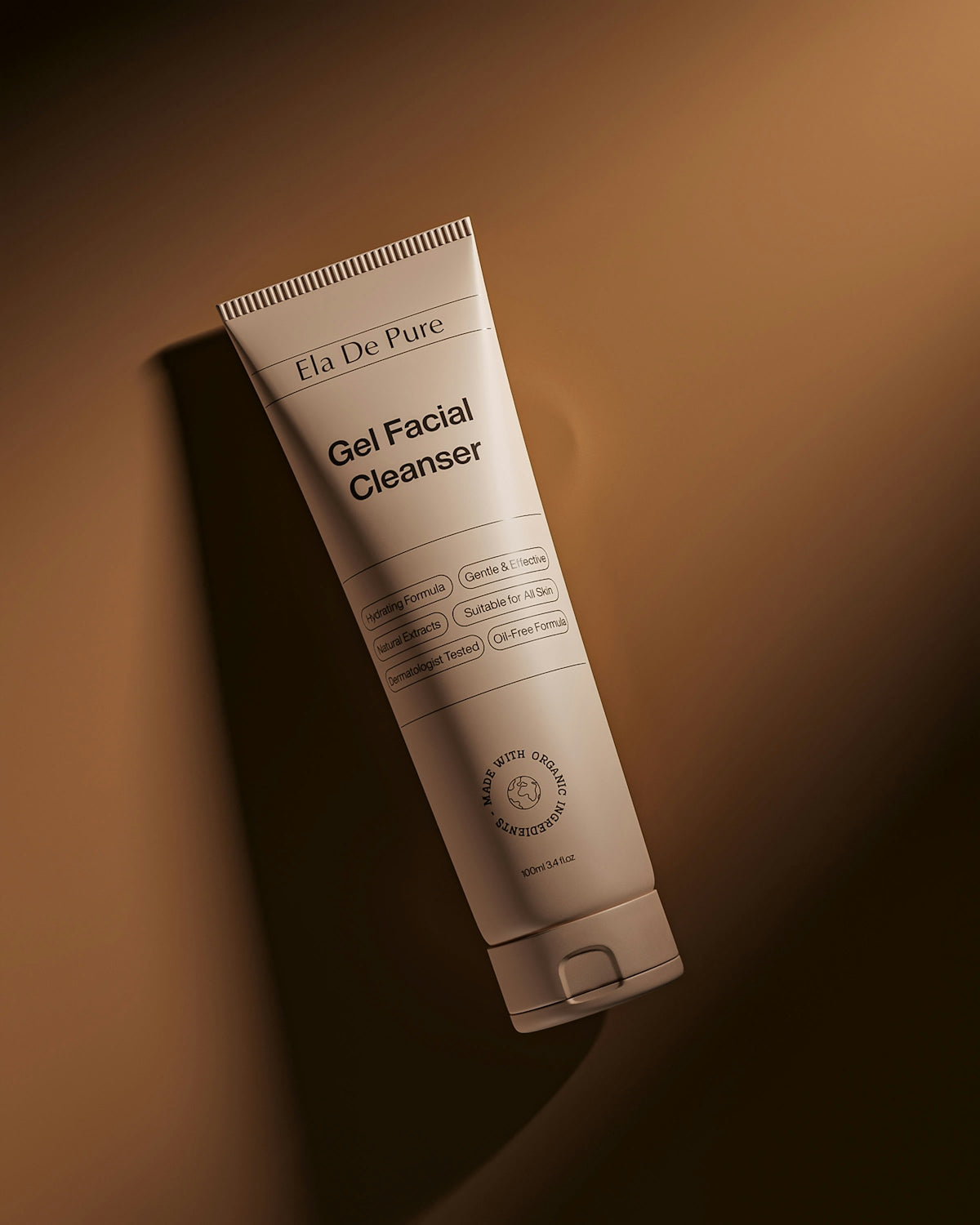 A tube of facial cleanser against a brown background.