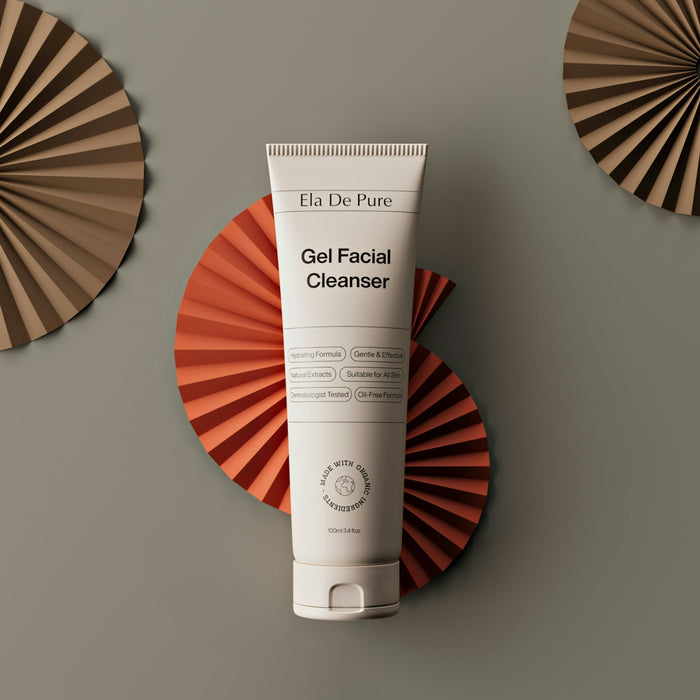 Facial cleanser is presented with decorative paper fans.