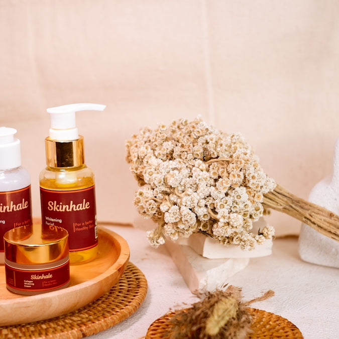 Skincare products are beautifully arranged for a display.